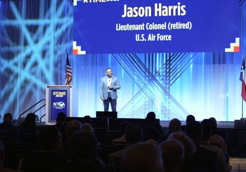 Jason O. Harris keynote speaker on stage